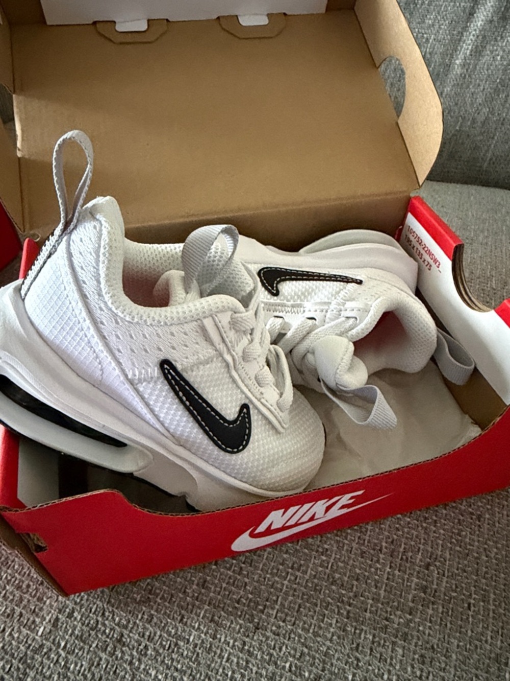 Nike Kids White Sneakers with Black Swoosh